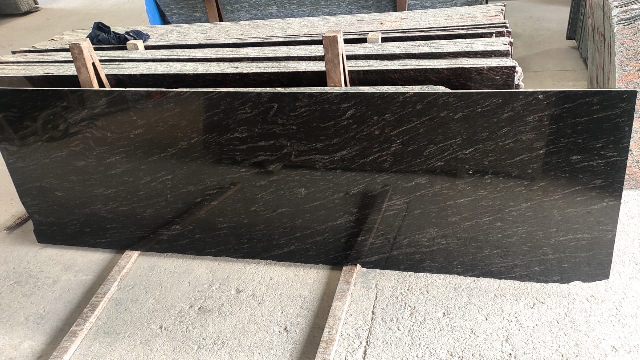 A polished Cross Martino granite slab on the finishing floor at our Chittorgarh plant